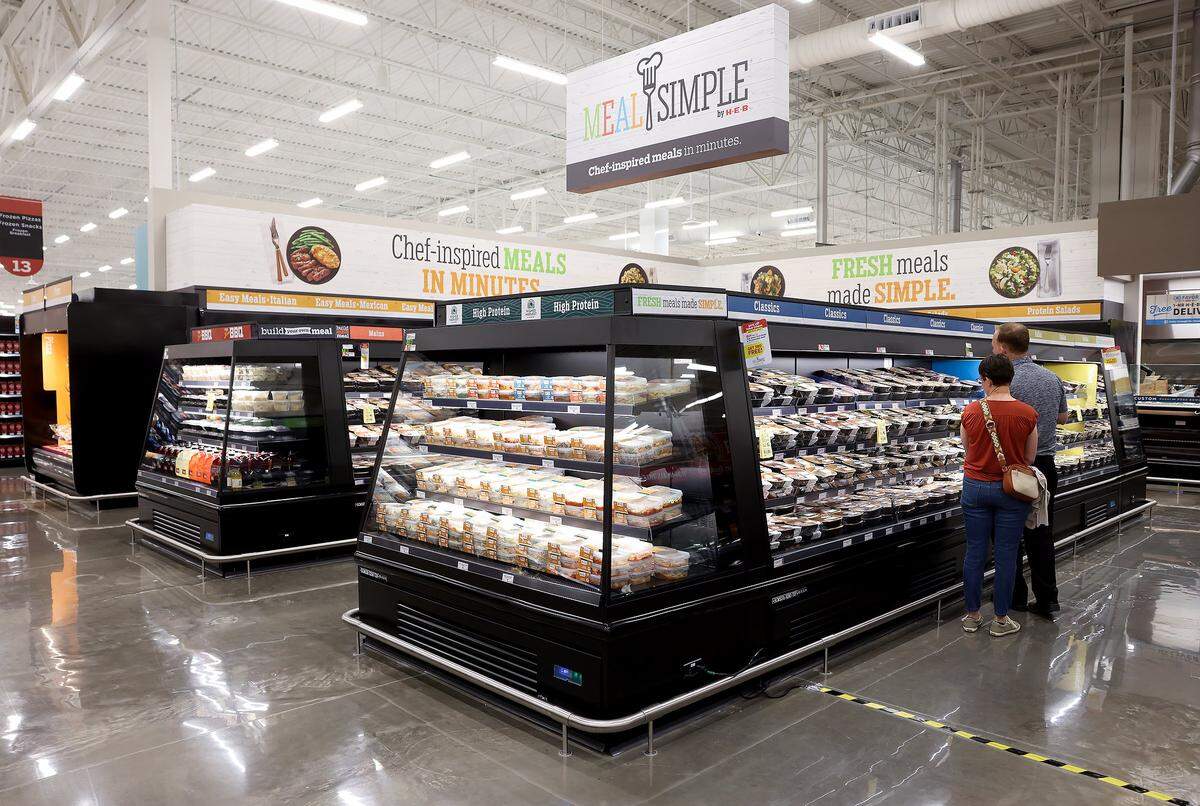 Guests look at the options for grab-and-go meals at the new Mid-Cities H-E-B on Tuesday, May 19, 2026. The popular Texas grocery store will open to the public on May 20.